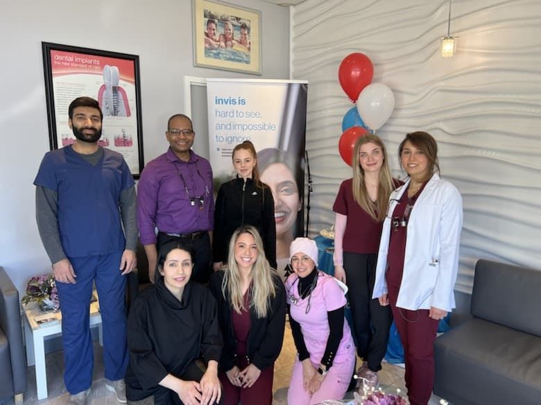 team photo at the orleans ottawa location, with Dr.Carlyle